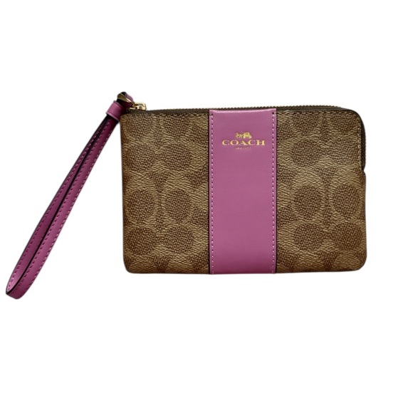 Coach Handbags - NWT coach Wristlet in tan and fuchsia